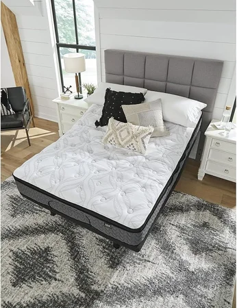 Hybrid mattress with pocketed coils and gel memory foam for back support