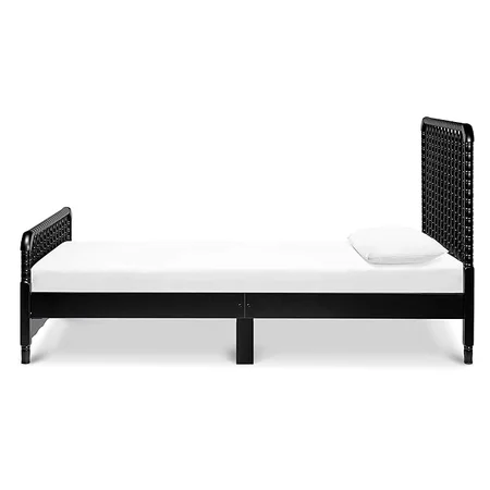 Sturdy wood construction of DaVinci Jenny Lind twin bed