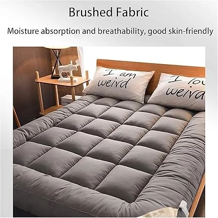 Foldable futon mattress used as guest bed in dorm room