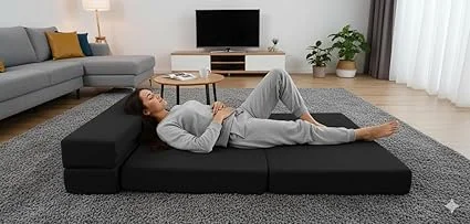 Portable bed mattress being carried for easy transport