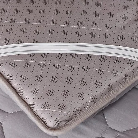 Generic student dormitory futon mattress providing comfortable sleeping surface