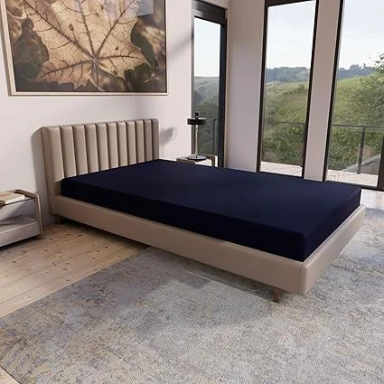 Rolled vinyl cover on Greaton mattress for durability