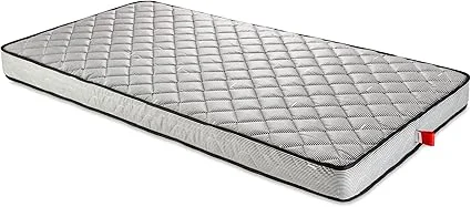 Hoggisleep 7 inch wide semi truck mattress on a truck bed