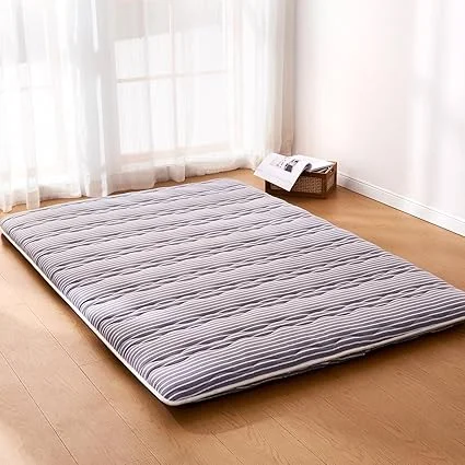 Close-up of Jzbearapt futon mattress showing thick high-density foam construction