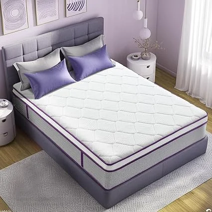Close-up of KBQ mattress layers showing pressure-relieving memory foam construction