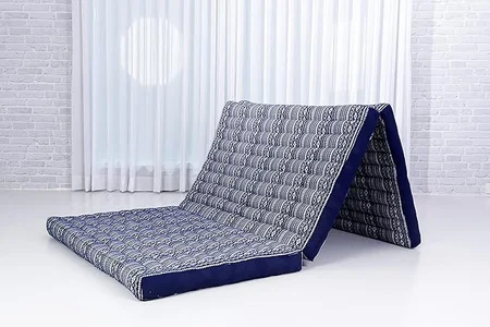 Kapok-filled mattress offering a foldable sleeping solution