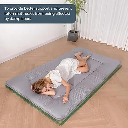 Portable futon mat by MAXYOYO, foldable design for versatile use as a floor bed