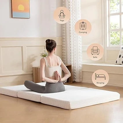 White twin MLILY memory foam mattress topper on a bed frame for added comfort