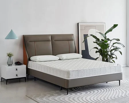 Close-up of pocket coil system and tight euro top on OLIVER & SMITH mattress