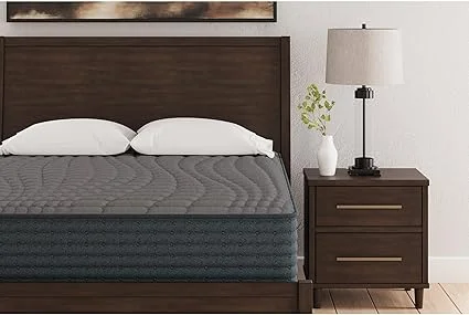 Signature Design by Ashley hybrid firm mattress in queen size, delivered in a box