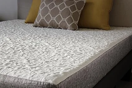 Premium textured 8-way stretch cover on Travel Happy mattress