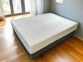 Excel Sleep 8-inch green tea memory foam mattress with zoned pressure relief in Olympic Queen size