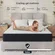 Anwickjeff full size mattress measuring 75x54 inches being unboxed