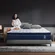 DINBooonLUX queen mattress featuring zoned support springs for spinal alignment