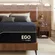 Side view of 14-inch thick Dyonery hybrid mattress showing layers