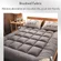 Foldable futon mattress used as guest bed in dorm room