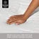 White and black queen size mattress on bed frame