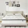 Happiland 10-inch hybrid queen mattress in unboxed setup