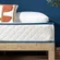 Hybrid mattress combining foam comfort layers with Bonnell springs