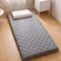 JINGTAOO folding roll up guest bed setup in a bedroom
