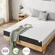 White OUUI queen mattress compressed in a box for easy delivery