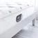 Close-up of reinforced edge support on W Hotels mattress for durability