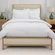 Westin Heavenly Bed fully set up in bedroom with hotel-inspired bedding